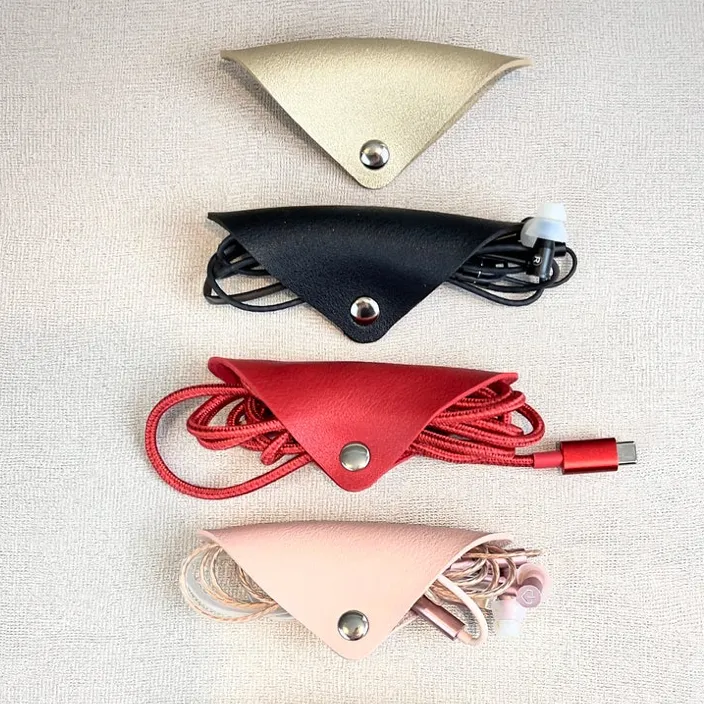 Cord Keepers. Pretty, Easy, Elegant Leather Organizers For Headphone and Chargers